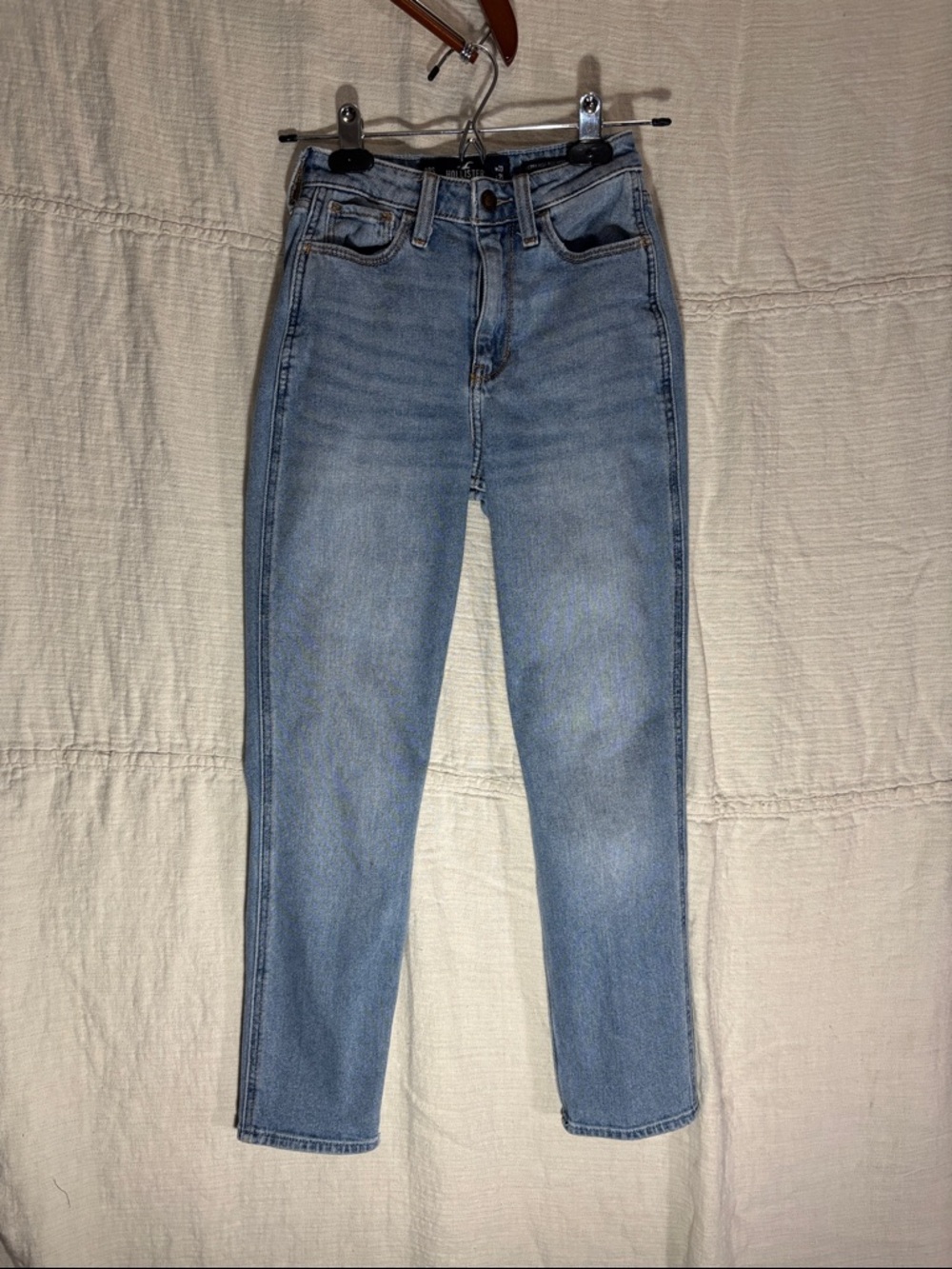 Hollister High-Rise Slim Straight Jeans in Light Wash Blue